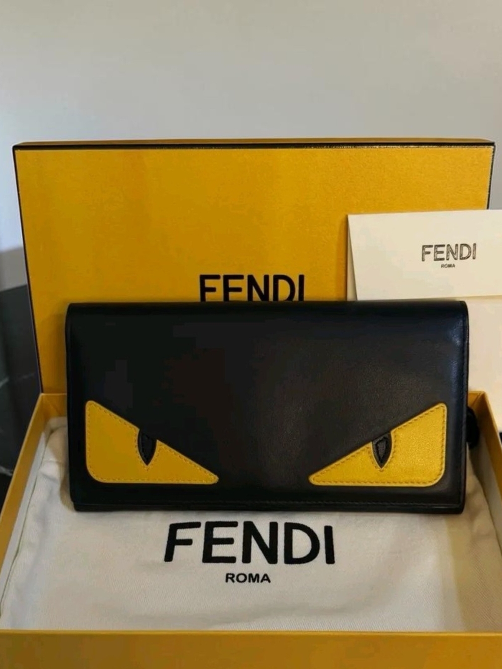 Fendi Black Leather Wallet with Yellow Eye Appliqués